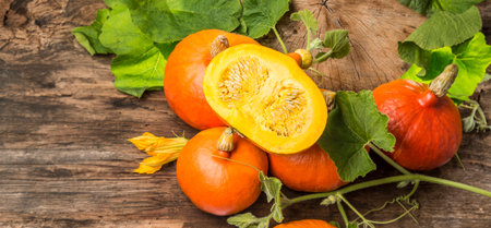Pumkins hokkaido on the wooden background close upの写真素材