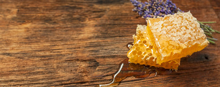 honeycomb on a wooden table close upの写真素材
