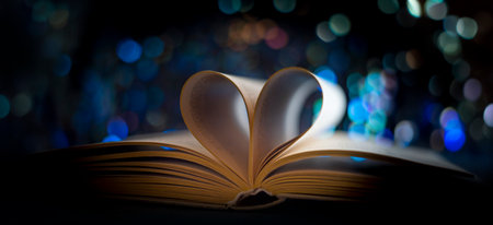 Heart from book pages., vintage photo style with bokeh backgroundの写真素材