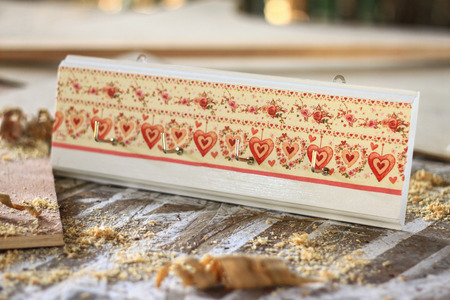 The hanging wall decor Made of wood and decorative tissue holder K Court Patras.の写真素材