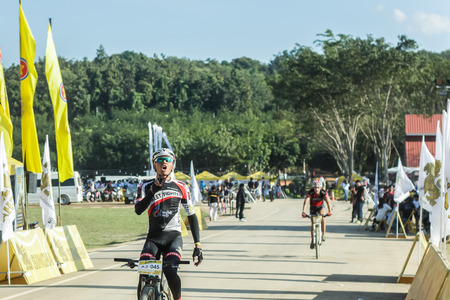 Chiang Rai Thailand -November 29 :Singha Mountain Bike Thailand Open 2014 in Chiang Rai - The mountain bike raceas of 29/11/2014 Place Boon Rawd Farm in Chiang Raiのeditorial素材