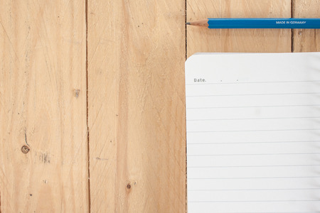 notebook on woodの写真素材