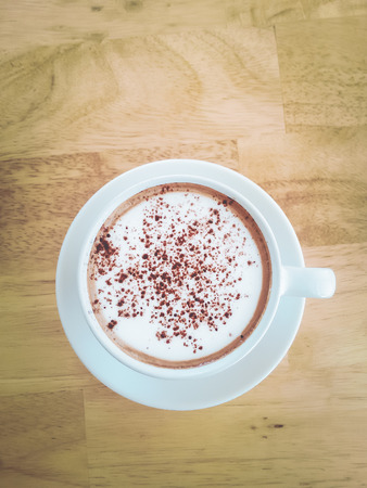 hot mocha coffee on wood table vintage toneの写真素材