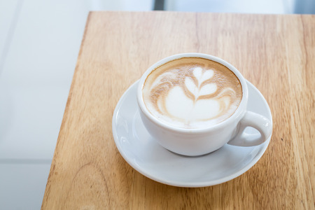 coffee latte  on wood tableの写真素材