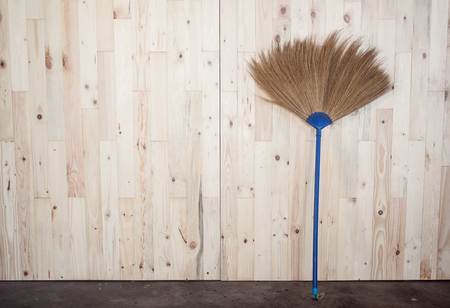 wooden wall pine Light color /broomの写真素材