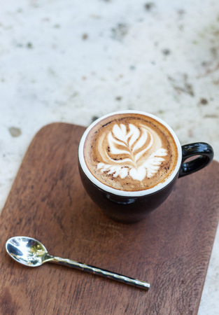 cappuccino cup on top old woodの写真素材
