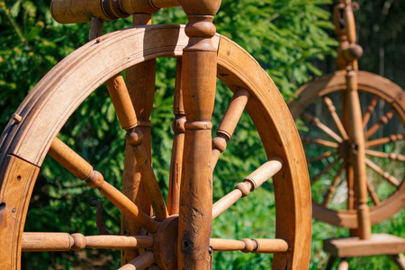 Old wooden spinning swirling amid the green park.の写真素材