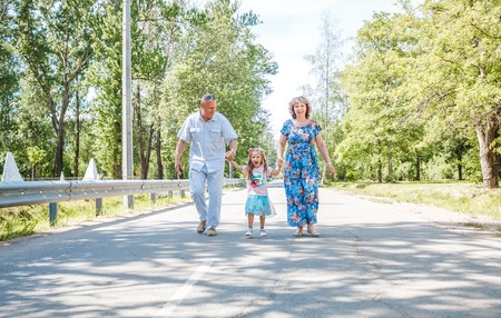 family, generation and people concept - happy smiling grandmother, grandfather and little...