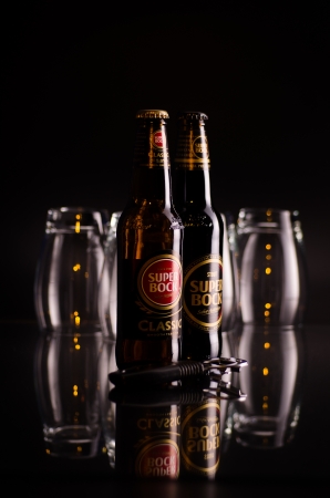 Two bottles of Super Bock beer with glassesのeditorial素材