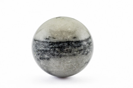 Zebra jasper polished sphere on white backgroudの写真素材