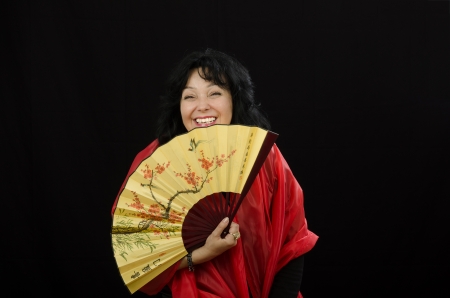 Actress laughs with a fanの写真素材