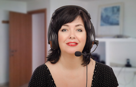 Portrait of bilingual teacher working online from home
