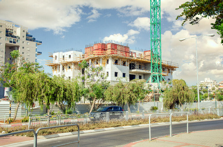 Rishon LeZion, Israel-June 10, 2017: The concrete cast multistory living quarters’ are at the...