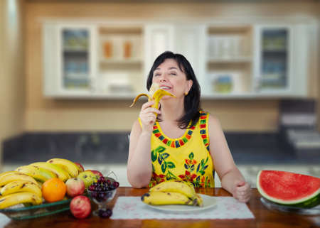 The secret of this woman's optimism is the daily eating of bananas.の写真素材