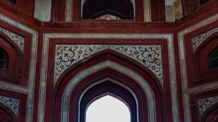 Details of the interior decoration of the mosque in the Taj Mahal complex. The arched entrance is...