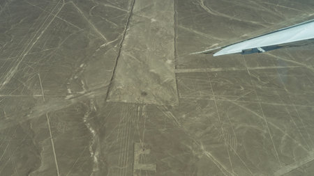 Incredible mystical Nazca lines in the desert. A drawing of a condor and part of a trapezoid. View...