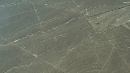 The unique mysterious Nazca lines. View from the height. There is a huge condor pattern on the sandy...
