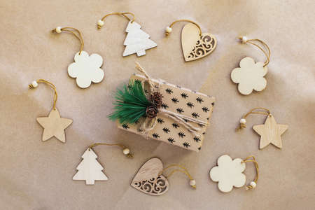 Christmas background from various wooden toys Christmas trees, hearts, flowers and stars around a...