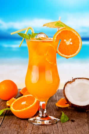 Summer drink with blur beach on background の写真素材