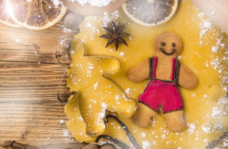 Gingerbread cookies and spices on wood plank の写真素材