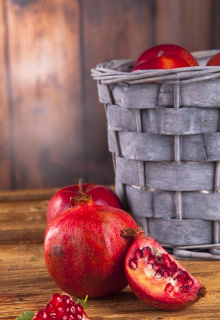 Fresh garnet juice on woodの写真素材