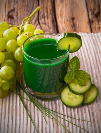 Healthy green cucumber, grape and lime juiceの写真素材