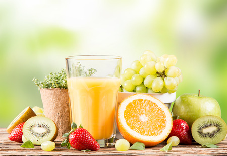 Fresh juice orange, Healthy drink on wood, breakfast concept, Nature fruits and vegetableの写真素材