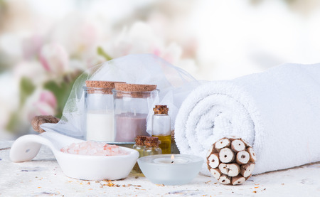 Spa concept still life with aromatic candles and flowerの写真素材