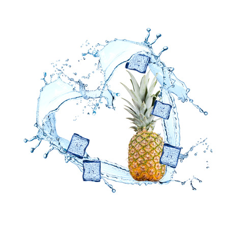 Water splash with fruits and ice cube isolated on white background. Fresh pineappleの写真素材