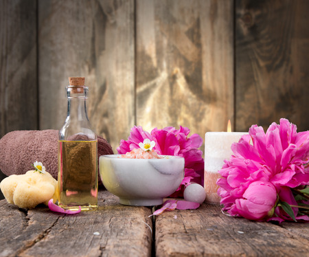 Spa massage setting, product, oil on woodenの写真素材