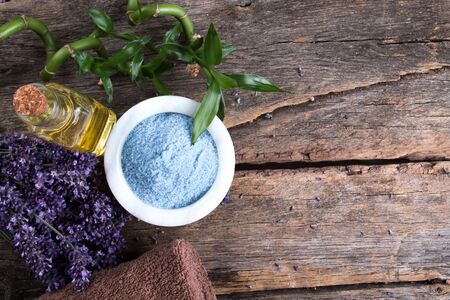 Spa massage setting, lavender product, oil on woodenの写真素材