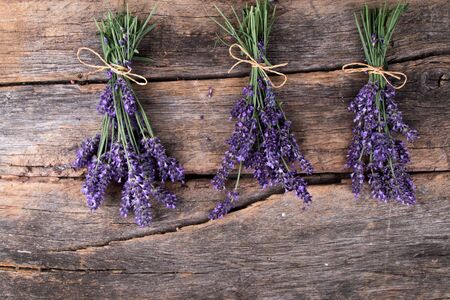 Spa massage setting, lavender product, oil on woodenの写真素材