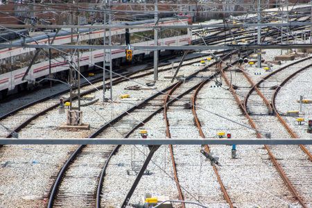 Railway tracks with a train and various equipment, showing railway complexity. Transportation...