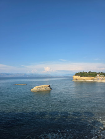 The iconic rock formations of Canal d'Amour in Sidari, Corfu, on a beautiful summer afternoon.