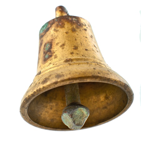 Old bronze bell with stains isolated