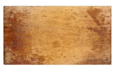 Old worn wooden cutting board isolataed on white