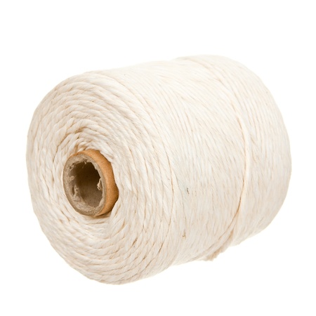 White thread spool isolated on white backgroundの写真素材