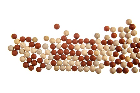 Little stone balls on white backgroundの写真素材