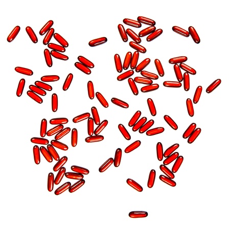 Shiny red pills isolated against a white background