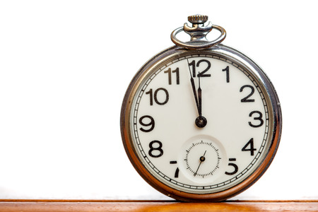 Pocket watch against white 