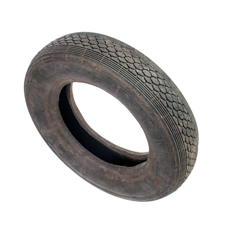 Small dirty old tire isolated on whiteの写真素材