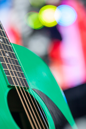 Abstract music background with green guitar, shallow depth of fieldの写真素材