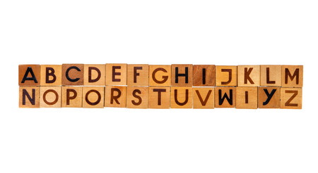English alphabet capital letters on wooden blocks in  two rows isolated over white