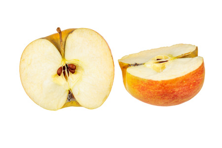 Two halfs of fresh organic apple isolated over white backgroundの写真素材