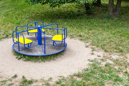 Roundabout in empty child playground