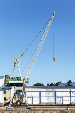 Port crane over blue skyの写真素材