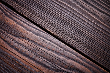 Vintage wooden wall, wooden house, close-up timber, boards for construction, natural building material, ecological construction.の写真素材