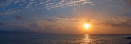 Panoramic image of sunrise over black sea.の写真素材