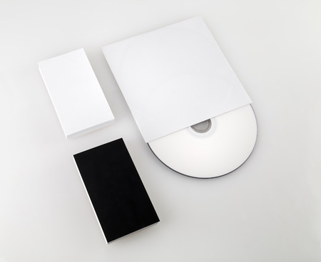 Blank black and white business cards and compact disk. Template for ID.の写真素材