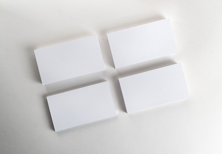 Blank business cards on the table. Template for ID. Top view.